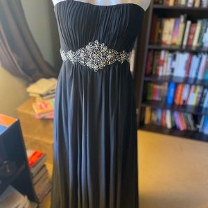 Black strapless gown with beading detail